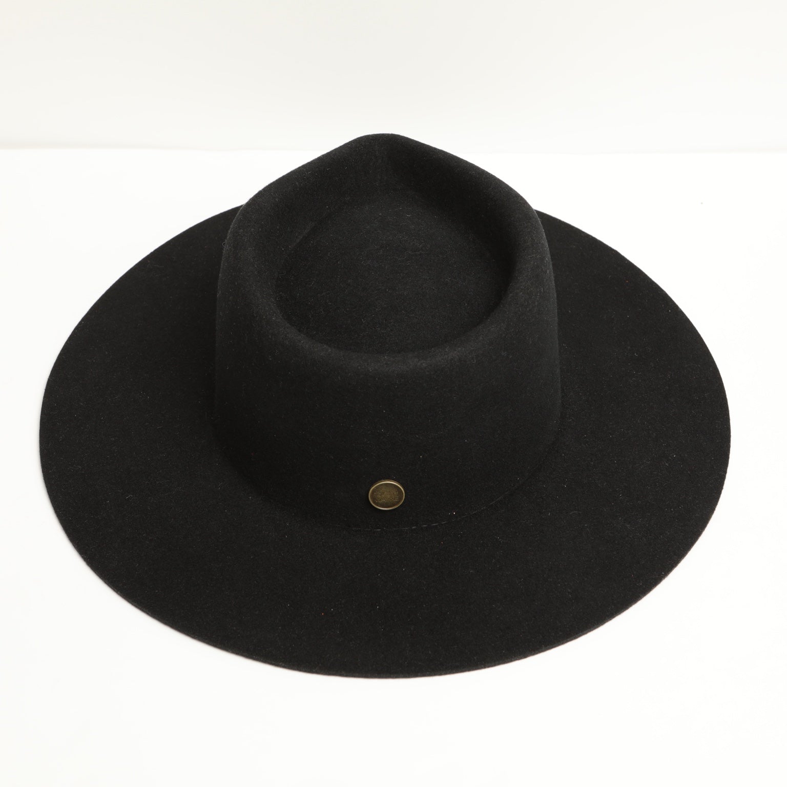 The Estate black fedora front view with signature pin