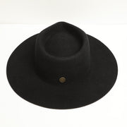 The Estate black fedora front view with signature pin
